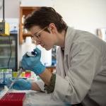 Elena Linster studying in a biological science lab